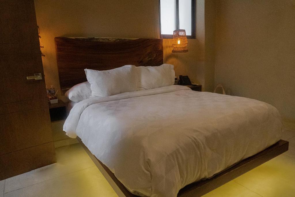 Postel nebo postele na pokoji v ubytování Hotel Scappata