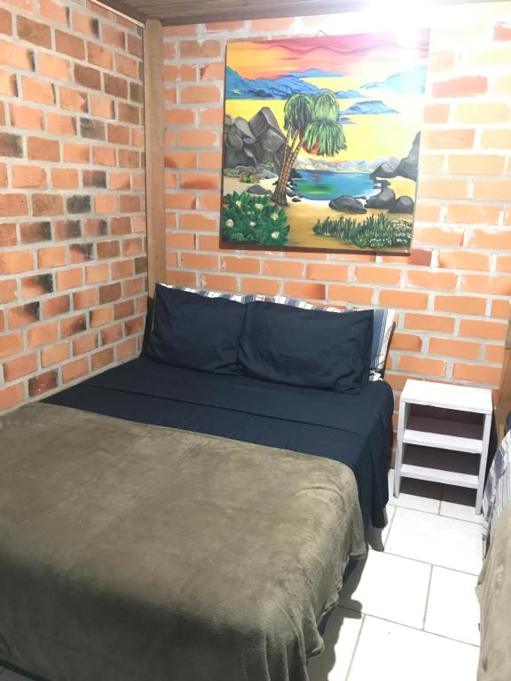 Postel nebo postele na pokoji v ubytování Tekoah Pousada