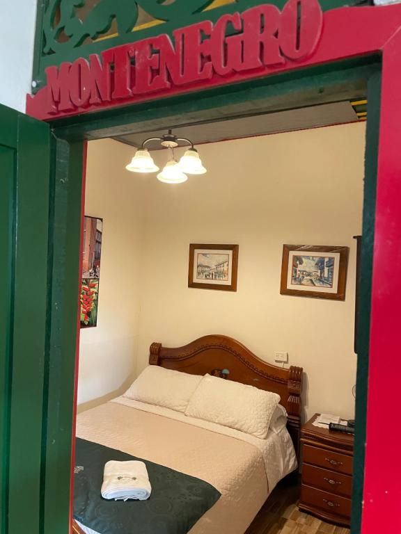 Postel nebo postele na pokoji v ubytování Aroma Cafetera