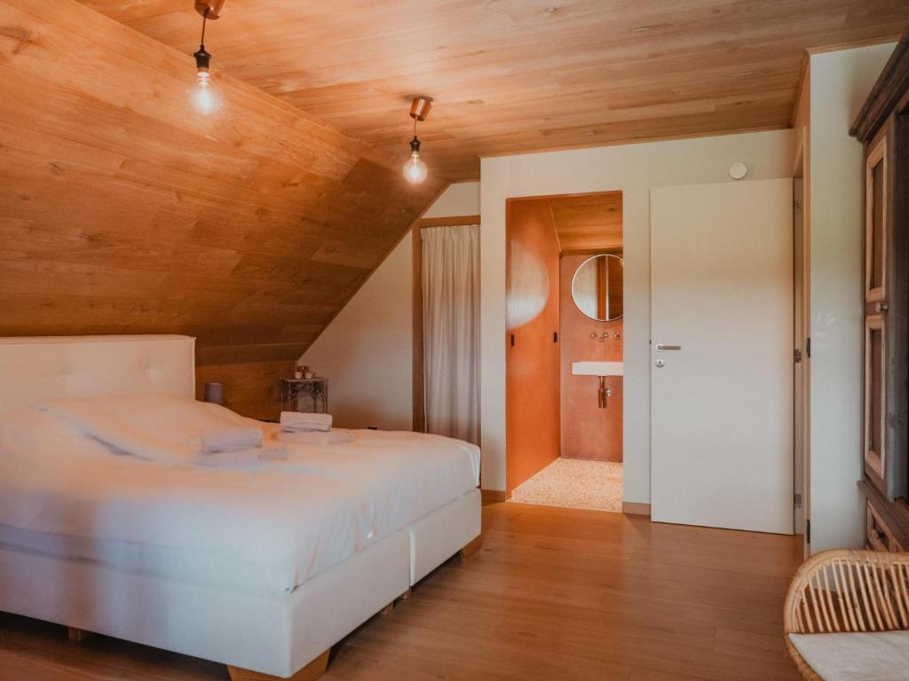 Postel nebo postele na pokoji v ubytování Villa Noortem