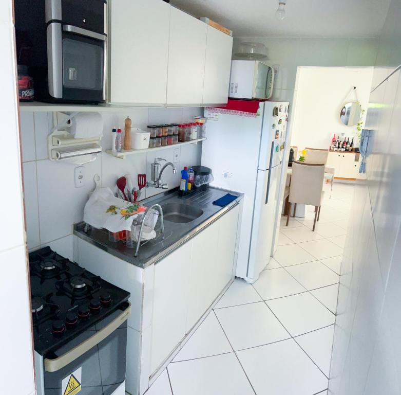 Kuchyň nebo kuchyňský kout v ubytování Quarto Encantado