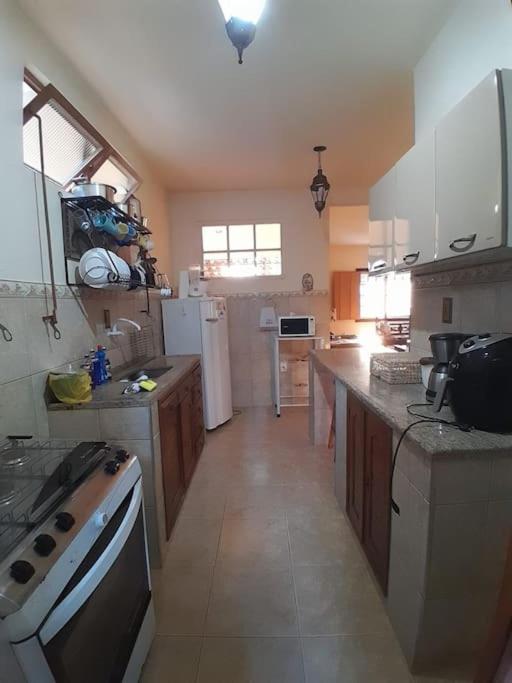 Kuchyň nebo kuchyňský kout v ubytování Casa Flamboiam