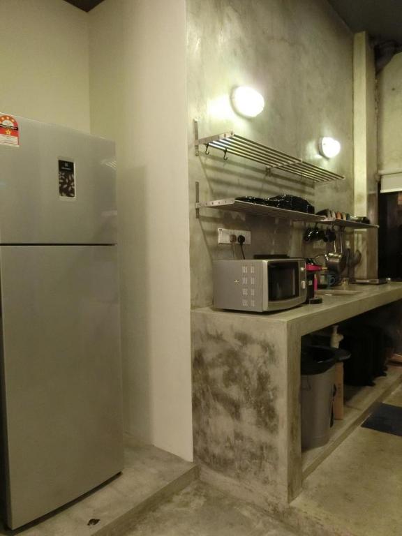 Kuchyň nebo kuchyňský kout v ubytování Revopackers Beds and Bunks