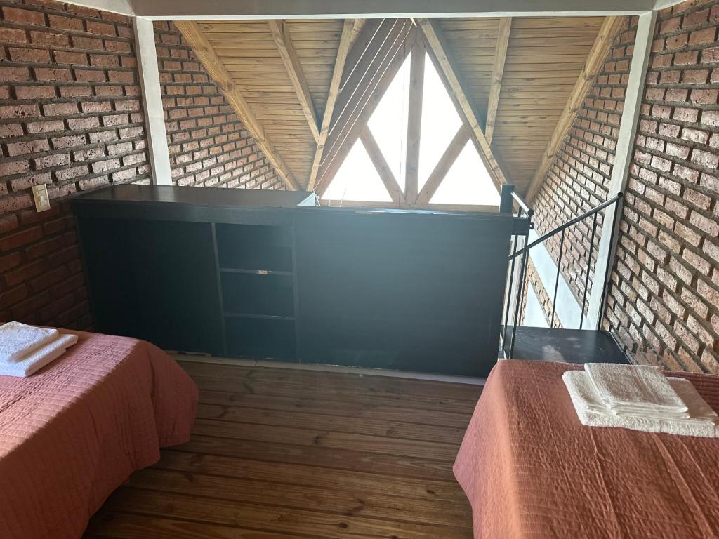 Postel nebo postele na pokoji v ubytování Kaizen Apart