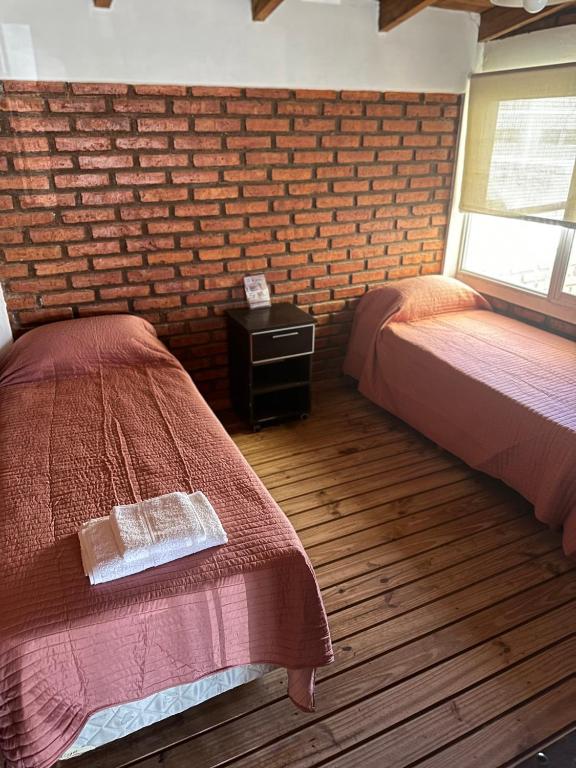 Postel nebo postele na pokoji v ubytování Kaizen Apart