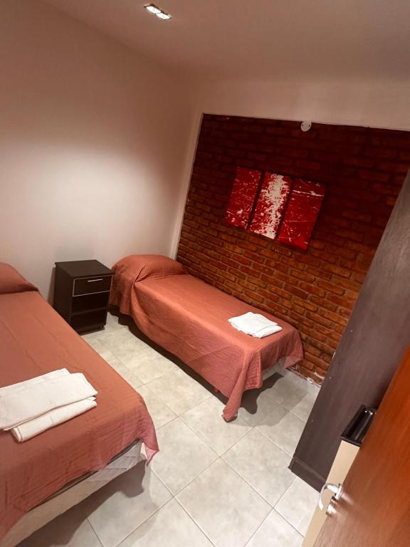 Postel nebo postele na pokoji v ubytování Kaizen Apart