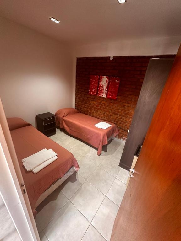 Postel nebo postele na pokoji v ubytování Kaizen Apart