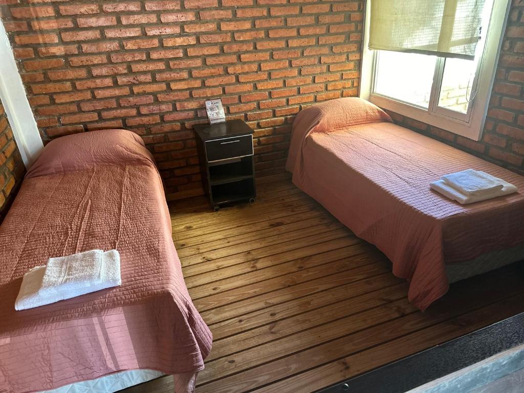 Postel nebo postele na pokoji v ubytování Kaizen Apart