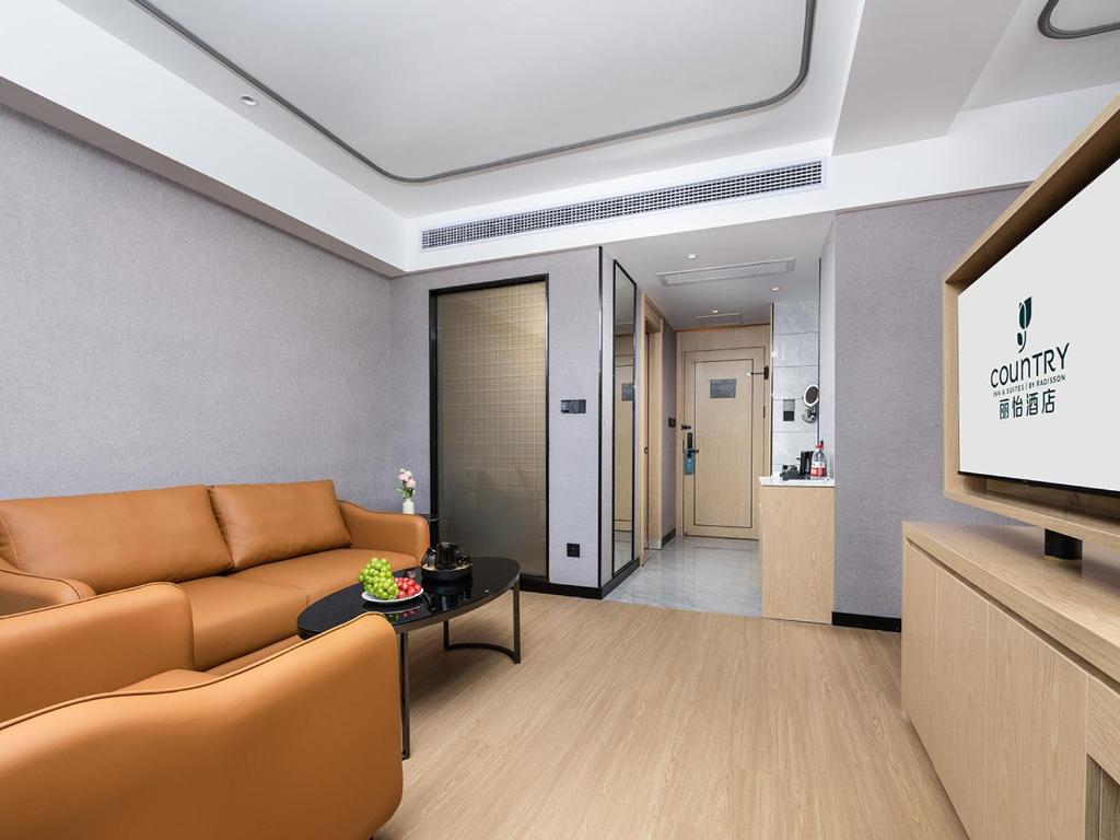 Posezení v ubytování Country Inn & Suites by Radisson Shenzhen International Convention and Exhibition Center