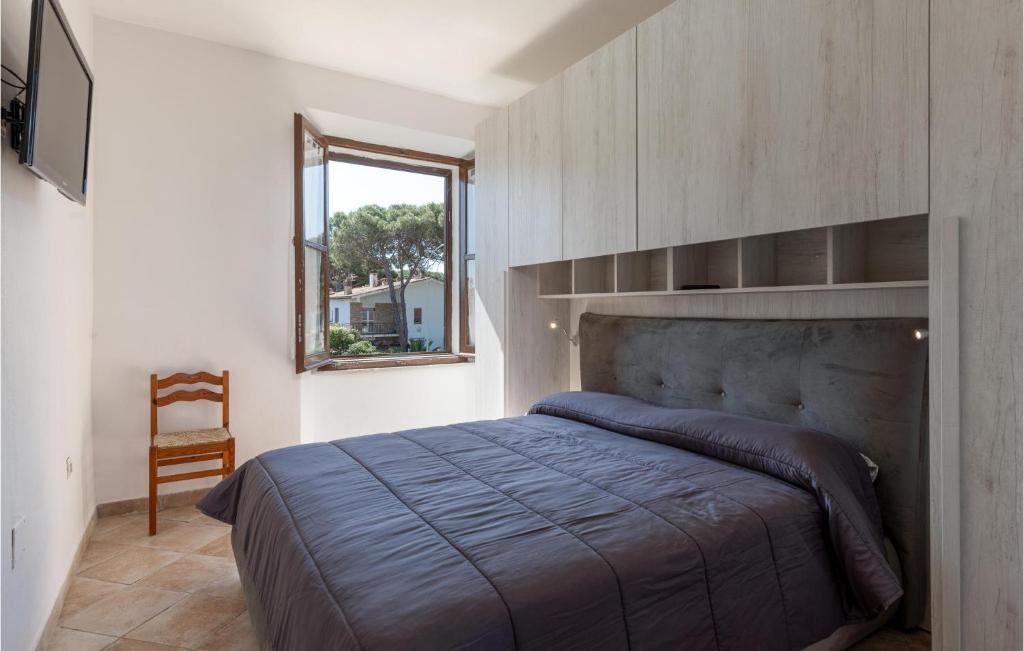 Postel nebo postele na pokoji v ubytování Stunning Apartment In Giannella