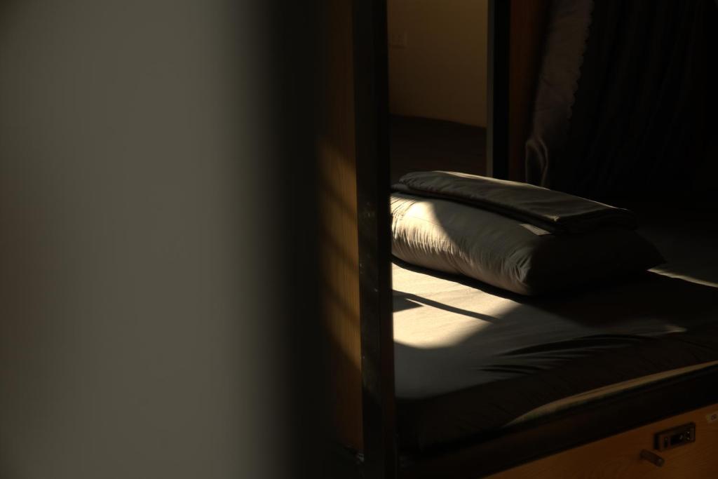 Postel nebo postele na pokoji v ubytování Quiri Hostel Hanoi