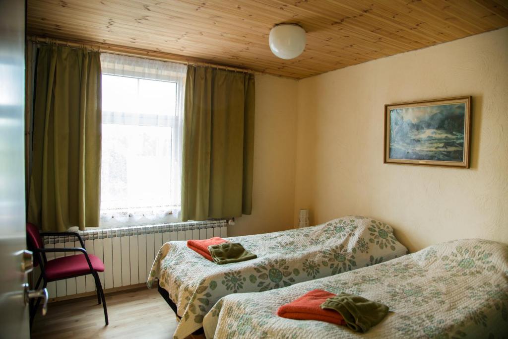 Voodi või voodid majutusasutuse Puuna Öömaja B&B toas