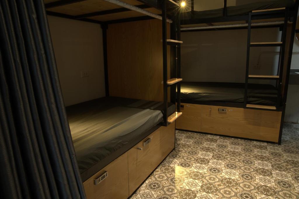 Postel nebo postele na pokoji v ubytování Quiri Hostel Hanoi