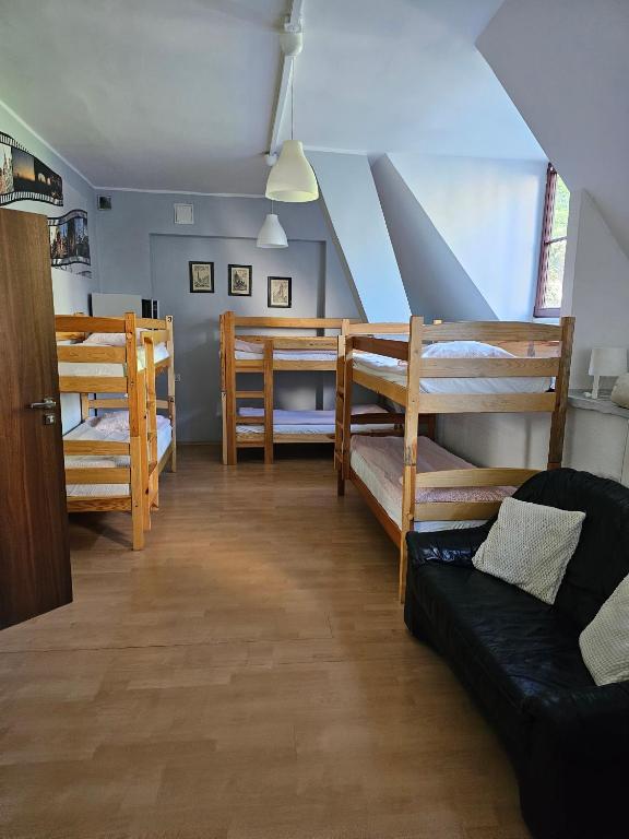 Postel nebo postele na pokoji v ubytování Hostel Universus