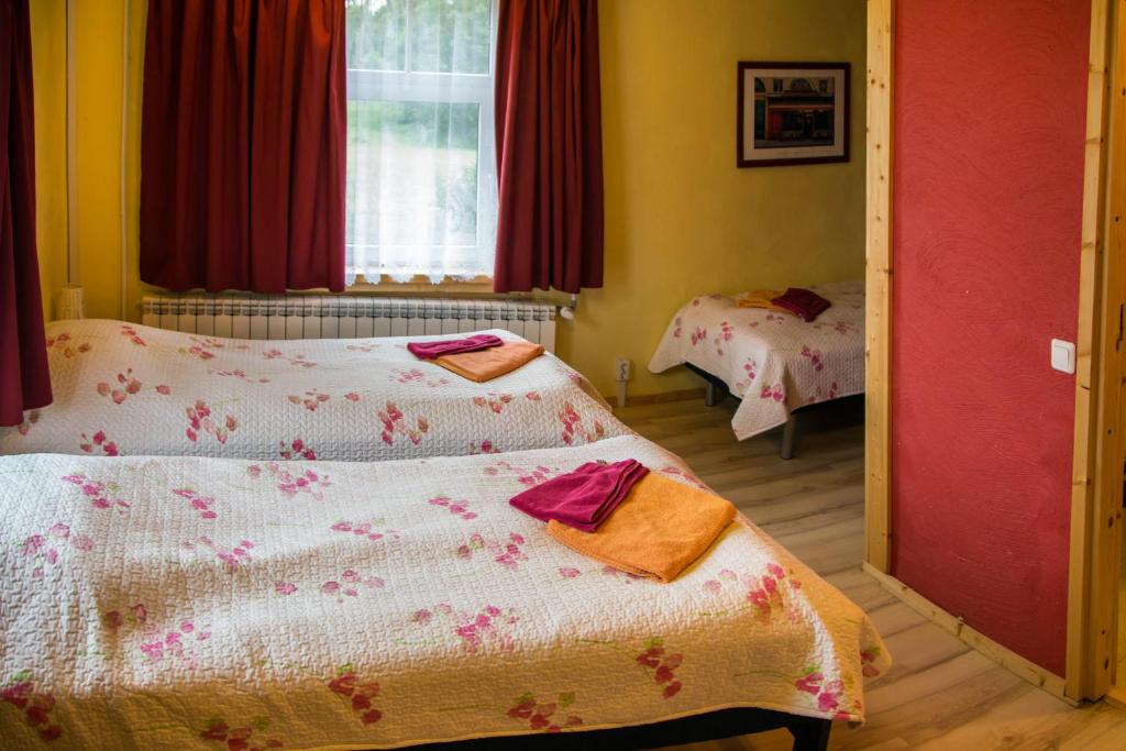 Voodi või voodid majutusasutuse Puuna Öömaja B&B toas