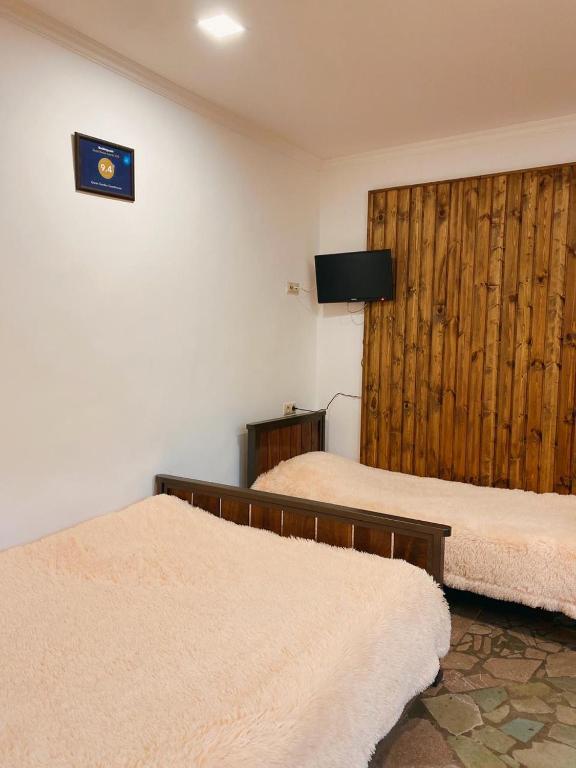 TV a/nebo společenská místnost v ubytování Green Garden B&B