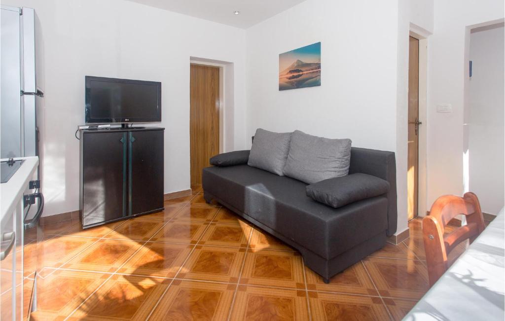 TV a/nebo společenská místnost v ubytování Apartment Mimice Mimice Brig Iv