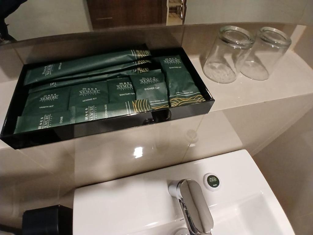 Koupelna v ubytování Nemuru Grand Suites