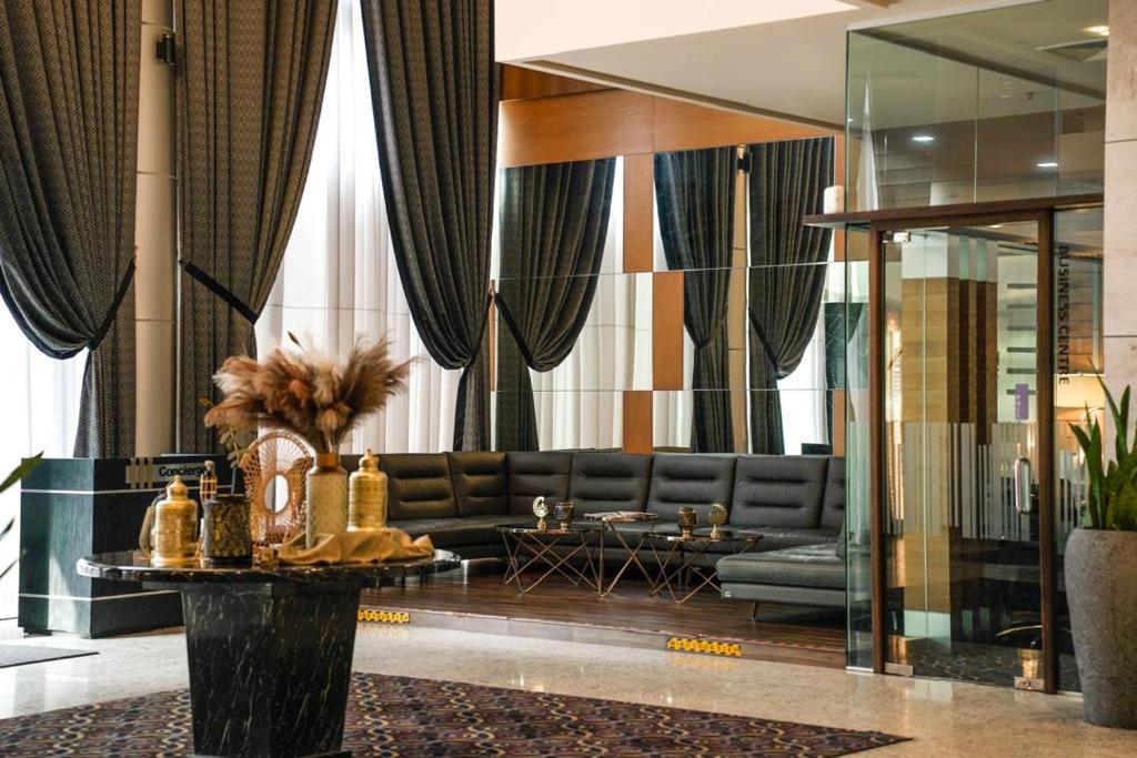 Posezení v ubytování New World Suites