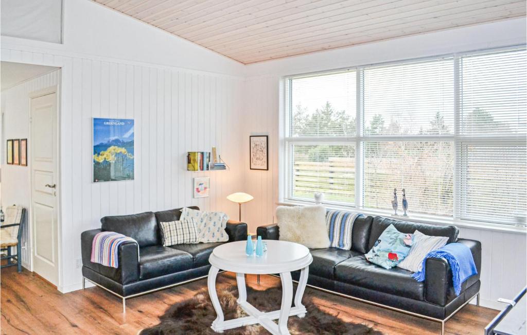 Posezení v ubytování Holiday Home Ebeltoft With Fireplace 06
