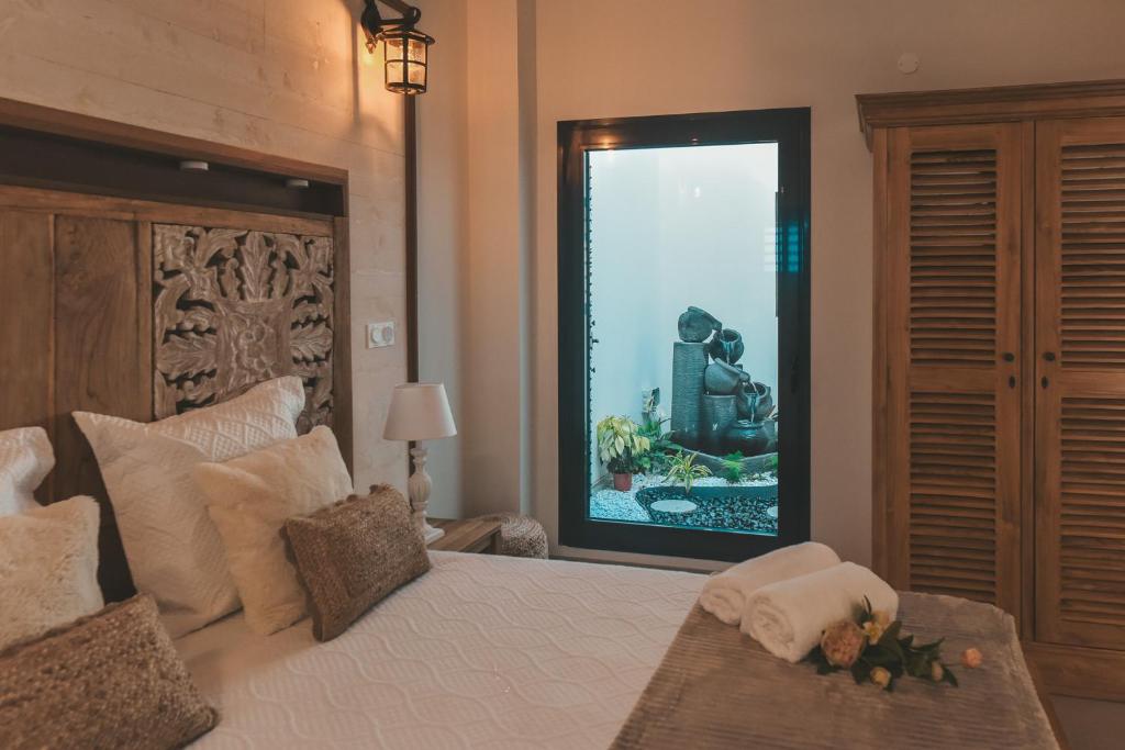Postel nebo postele na pokoji v ubytování Le Chant de L'Océan - Villa 5 étoiles