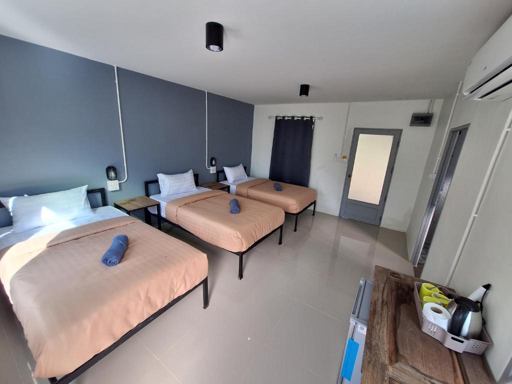 Postel nebo postele na pokoji v ubytování Slumberland at Pai
