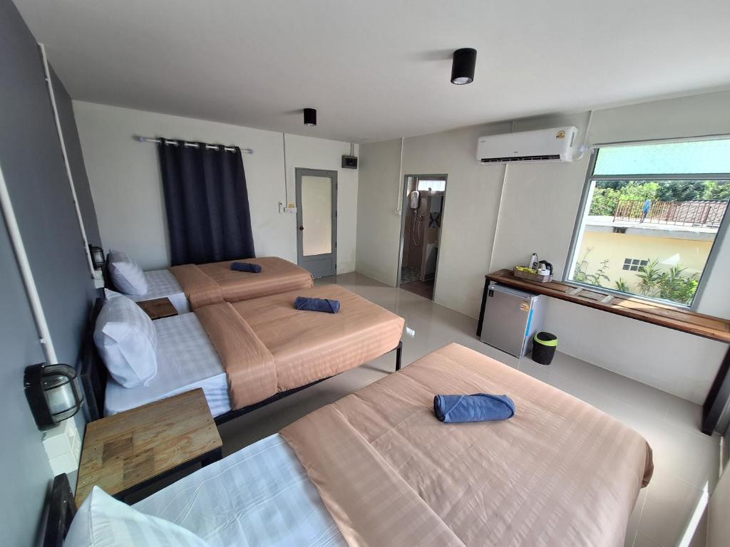 Postel nebo postele na pokoji v ubytování Slumberland at Pai