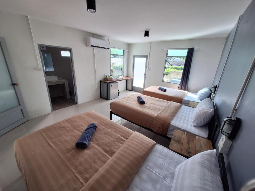 Postel nebo postele na pokoji v ubytování Slumberland at Pai
