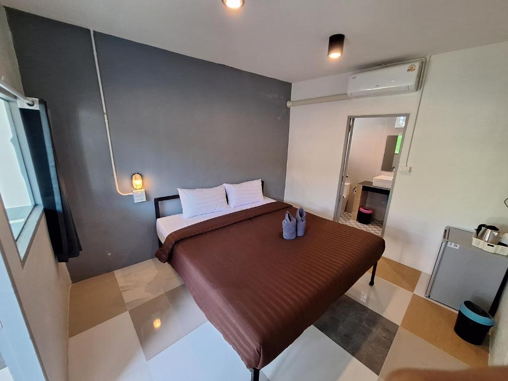 Postel nebo postele na pokoji v ubytování Slumberland at Pai