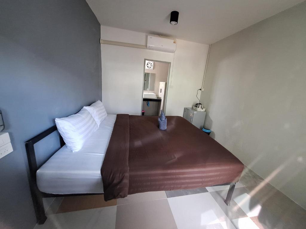 Postel nebo postele na pokoji v ubytování Slumberland at Pai