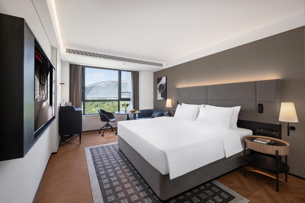 Postel nebo postele na pokoji v ubytování Intercity Hotel Chengdu High-tech Global Center