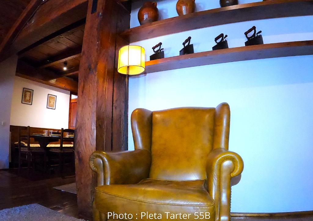 Posezení v ubytování AC Apartaments Tarter Chalet