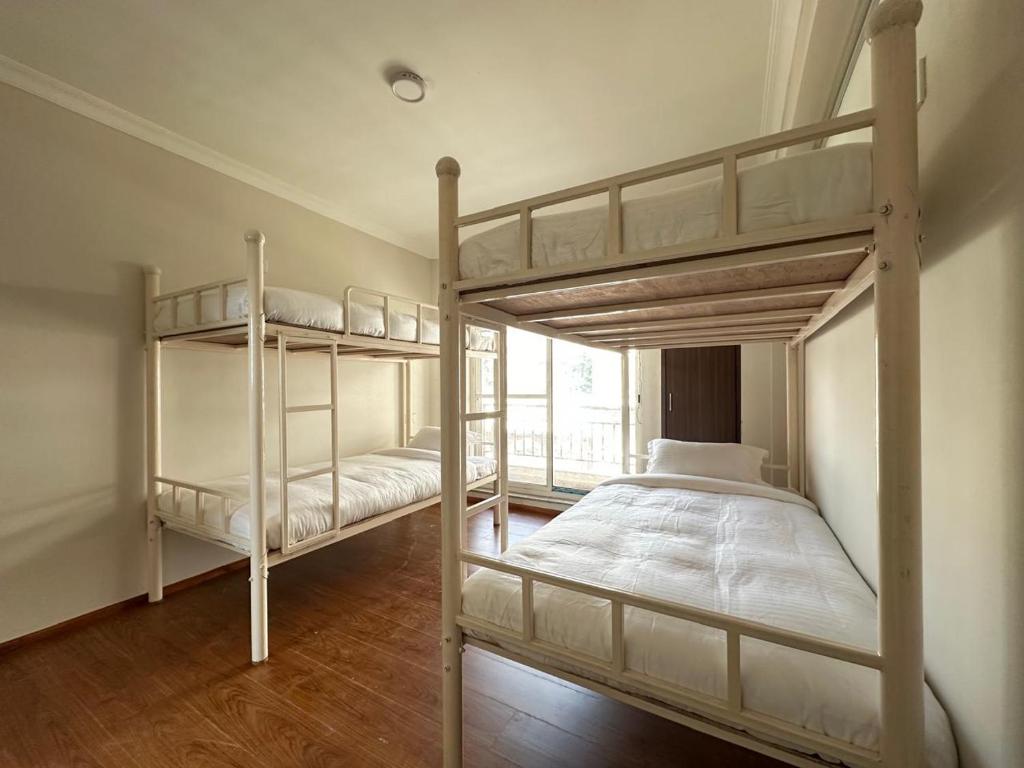 Postel nebo postele na pokoji v ubytování Hotel Sohum