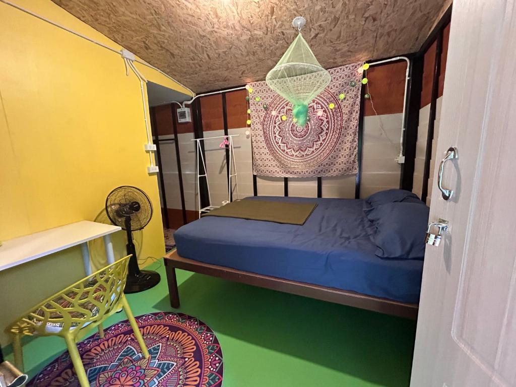 Postel nebo postele na pokoji v ubytování Hippy Hut Koh Chang