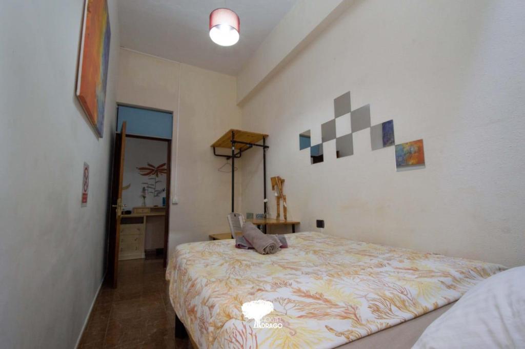 Postel nebo postele na pokoji v ubytování Drago Hostel