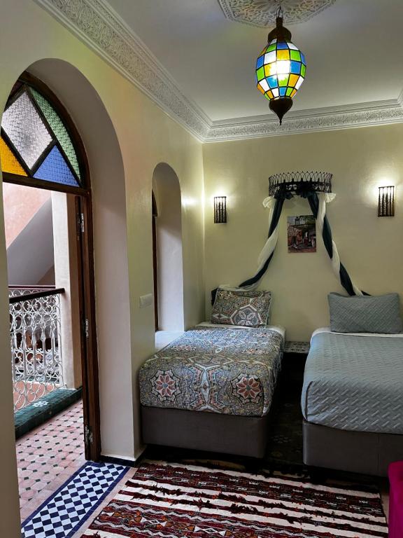 Postel nebo postele na pokoji v ubytování Casa Indigo