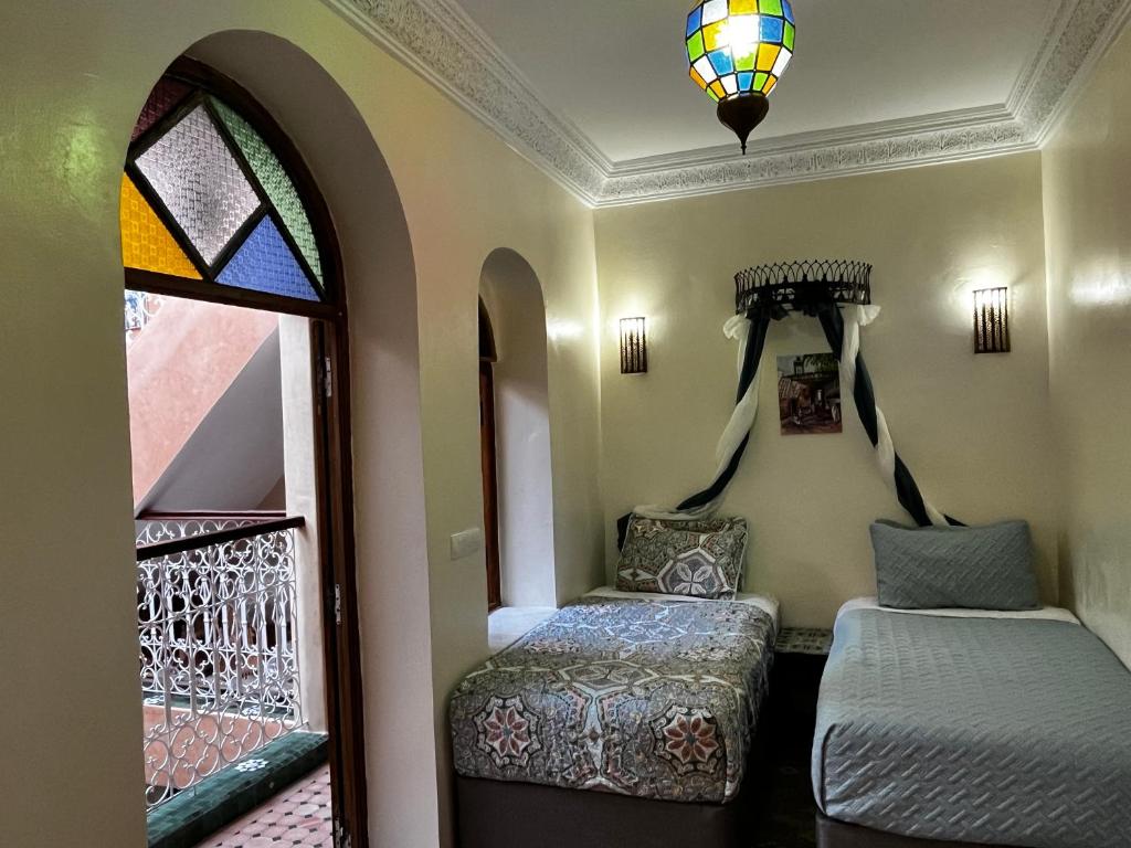 Postel nebo postele na pokoji v ubytování Casa Indigo