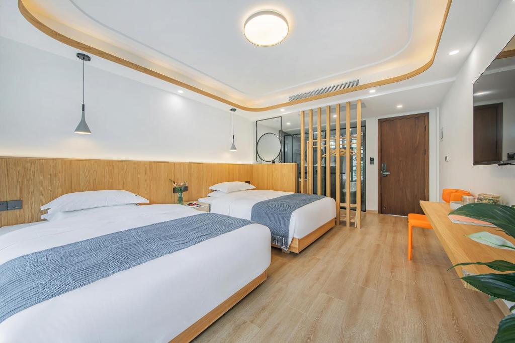 安吉季意民宿 Jiyi Boutique Homestay, Anji, Huzhou 객실 침대