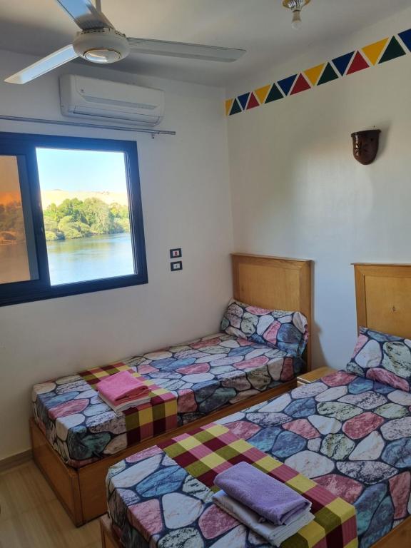 Postel nebo postele na pokoji v ubytování ABAZIDO Nubian Guest House