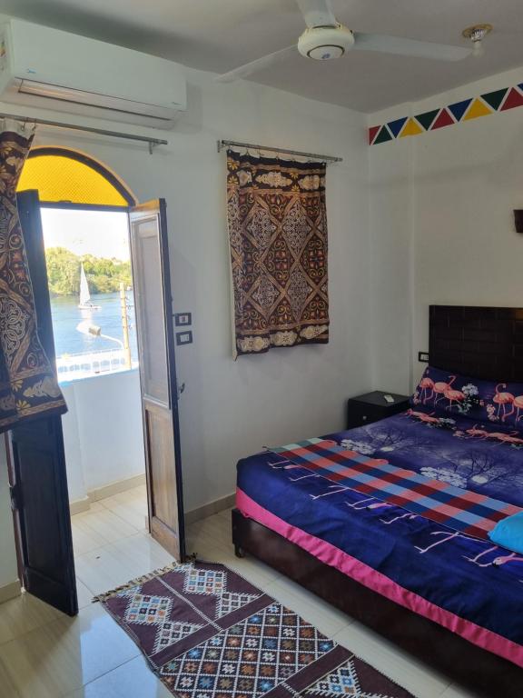 Postel nebo postele na pokoji v ubytování ABAZIDO Nubian Guest House