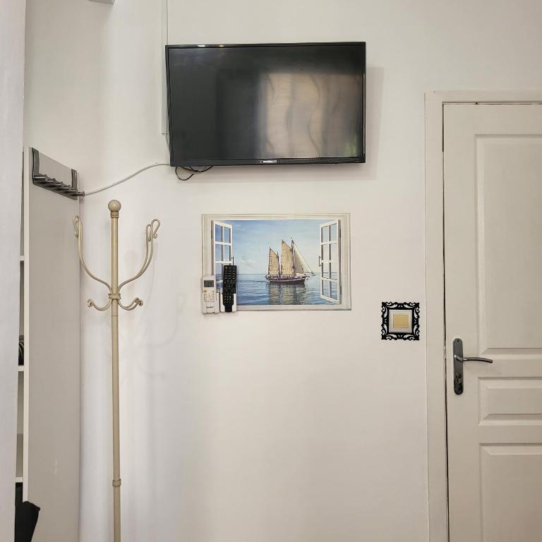 TV a/nebo společenská místnost v ubytování Studio centre ville