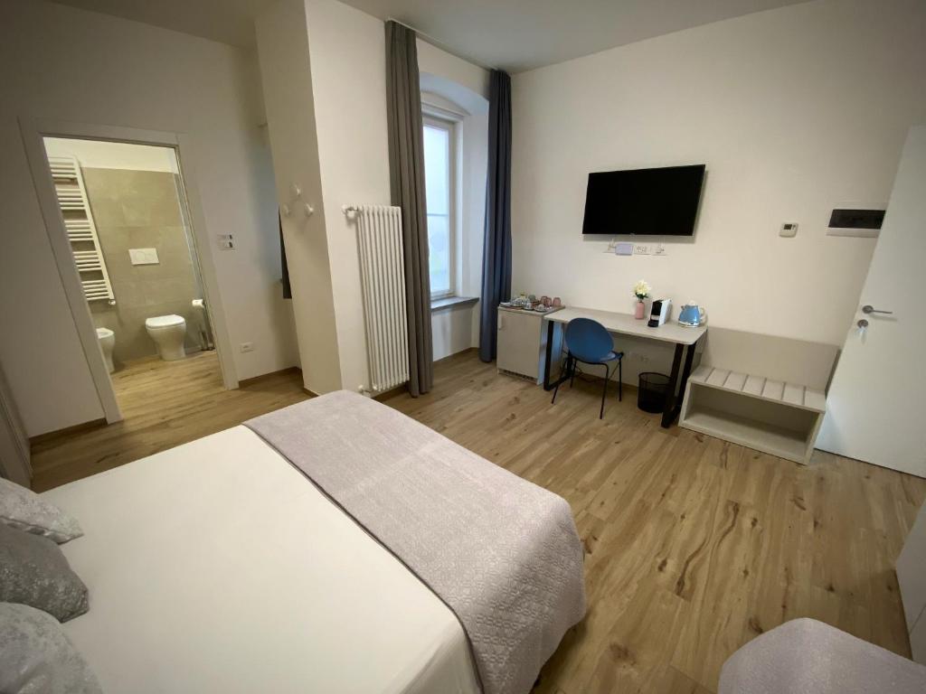 Postel nebo postele na pokoji v ubytování Five Flowers Guest House