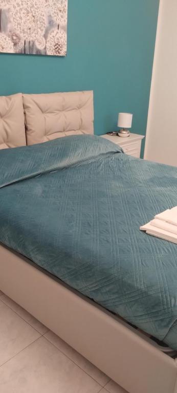 Posteľ alebo postele v izbe v ubytovaní LA CASA DI NONNA LUCIA