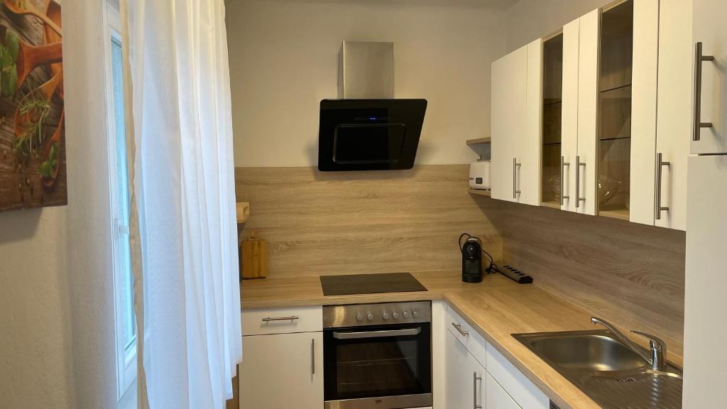 Kuchyň nebo kuchyňský kout v ubytování Wunderschöne Stadtwohnung