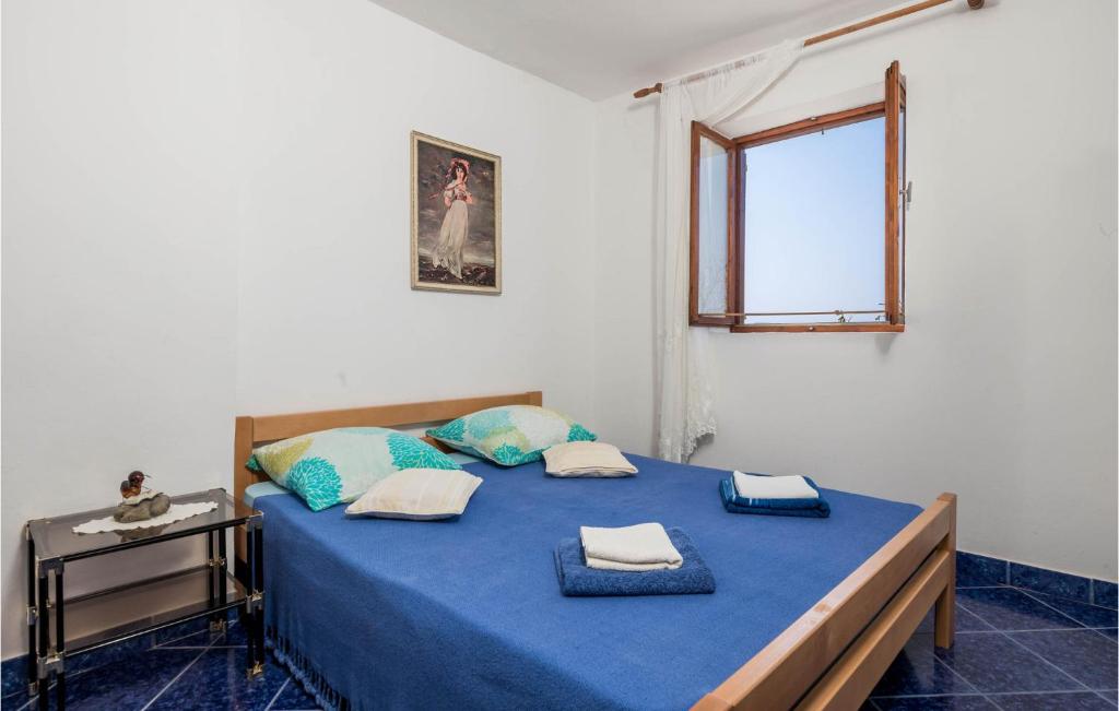 Posteľ alebo postele v izbe v ubytovaní Nice Apartment In Stinica With Wifi