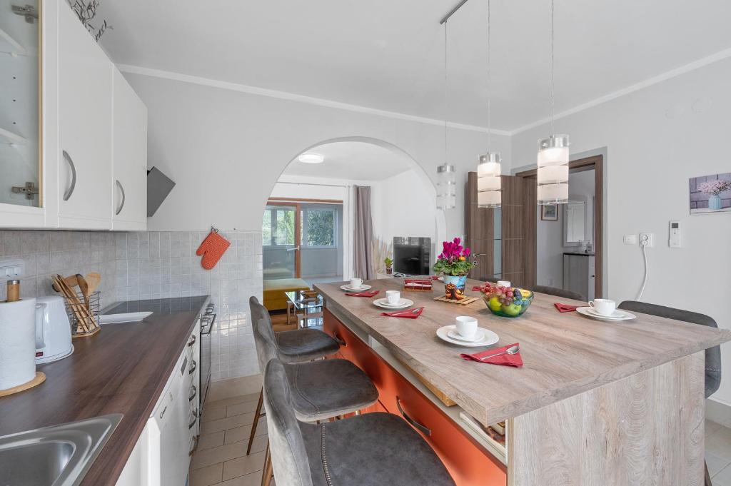 Kuchyň nebo kuchyňský kout v ubytování Family House Sonja