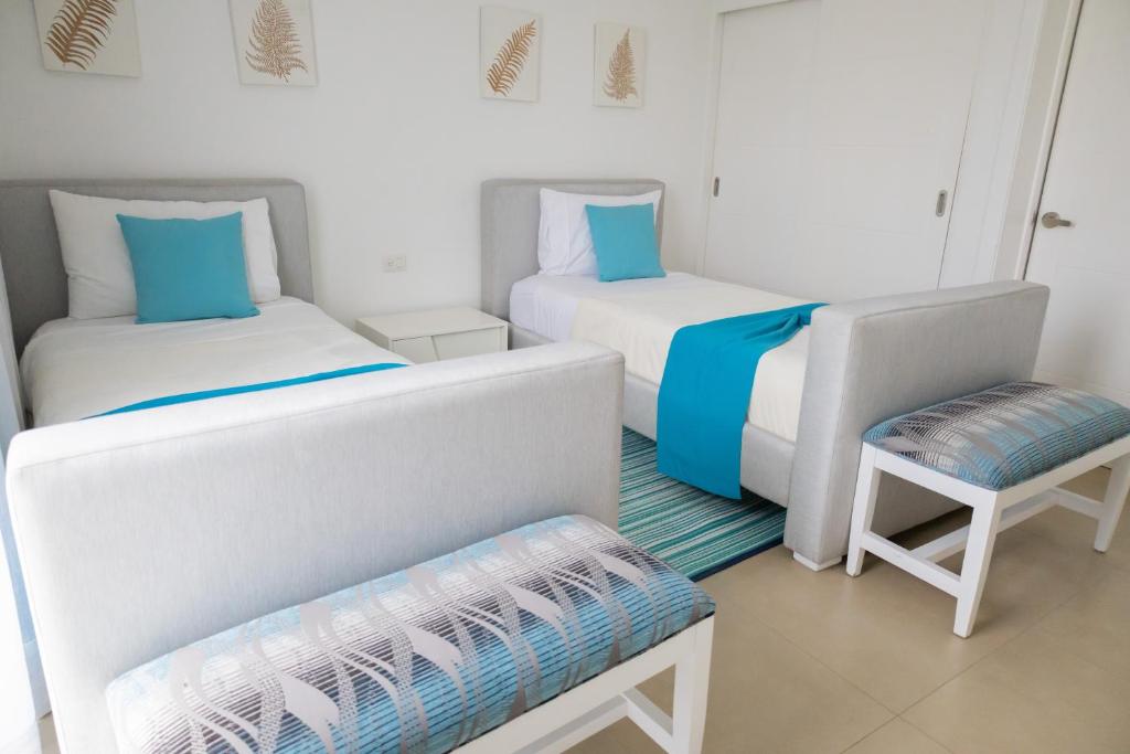 Postel nebo postele na pokoji v ubytování Ka' Romana Residences