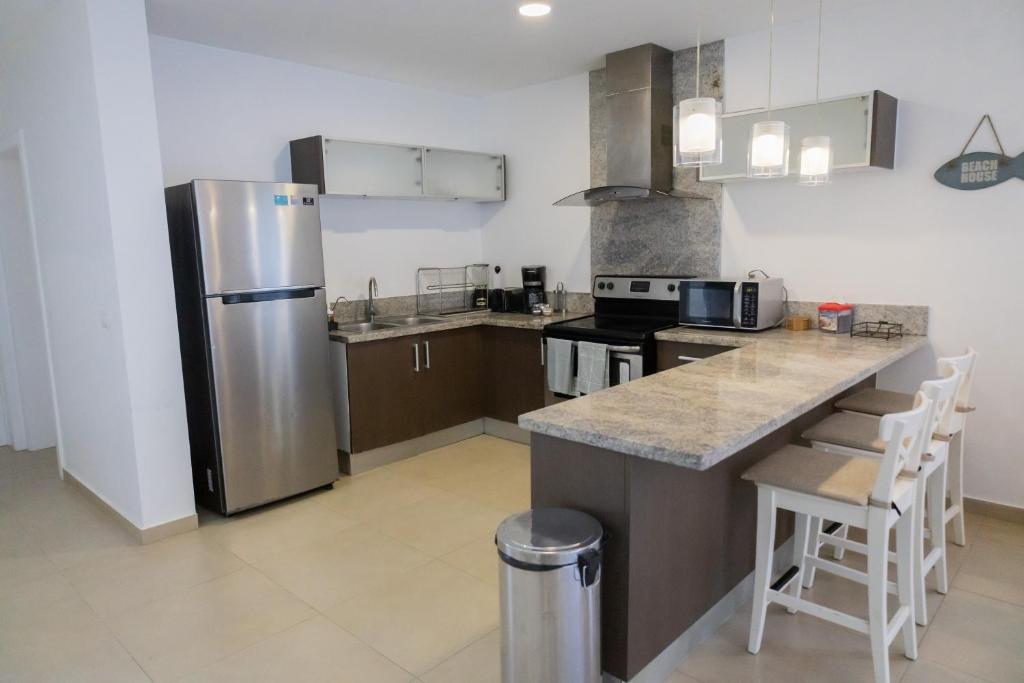 Kuchyň nebo kuchyňský kout v ubytování Ka' Romana Residences