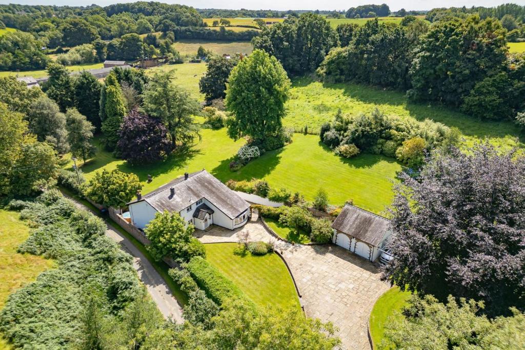 an aerial view of a house with a garden at Garden Cottage in Cuddington