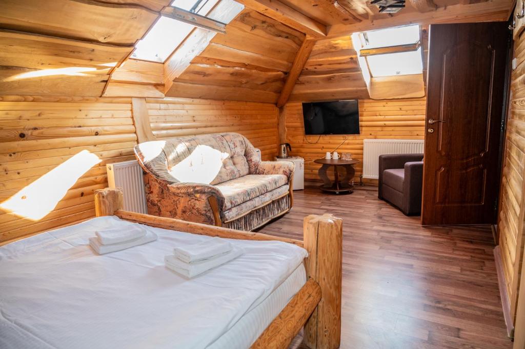 Postel nebo postele na pokoji v ubytování Kisva Hotel